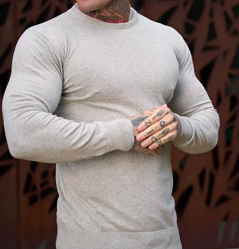 Pull-over basique à col rond et maille unie pour homme